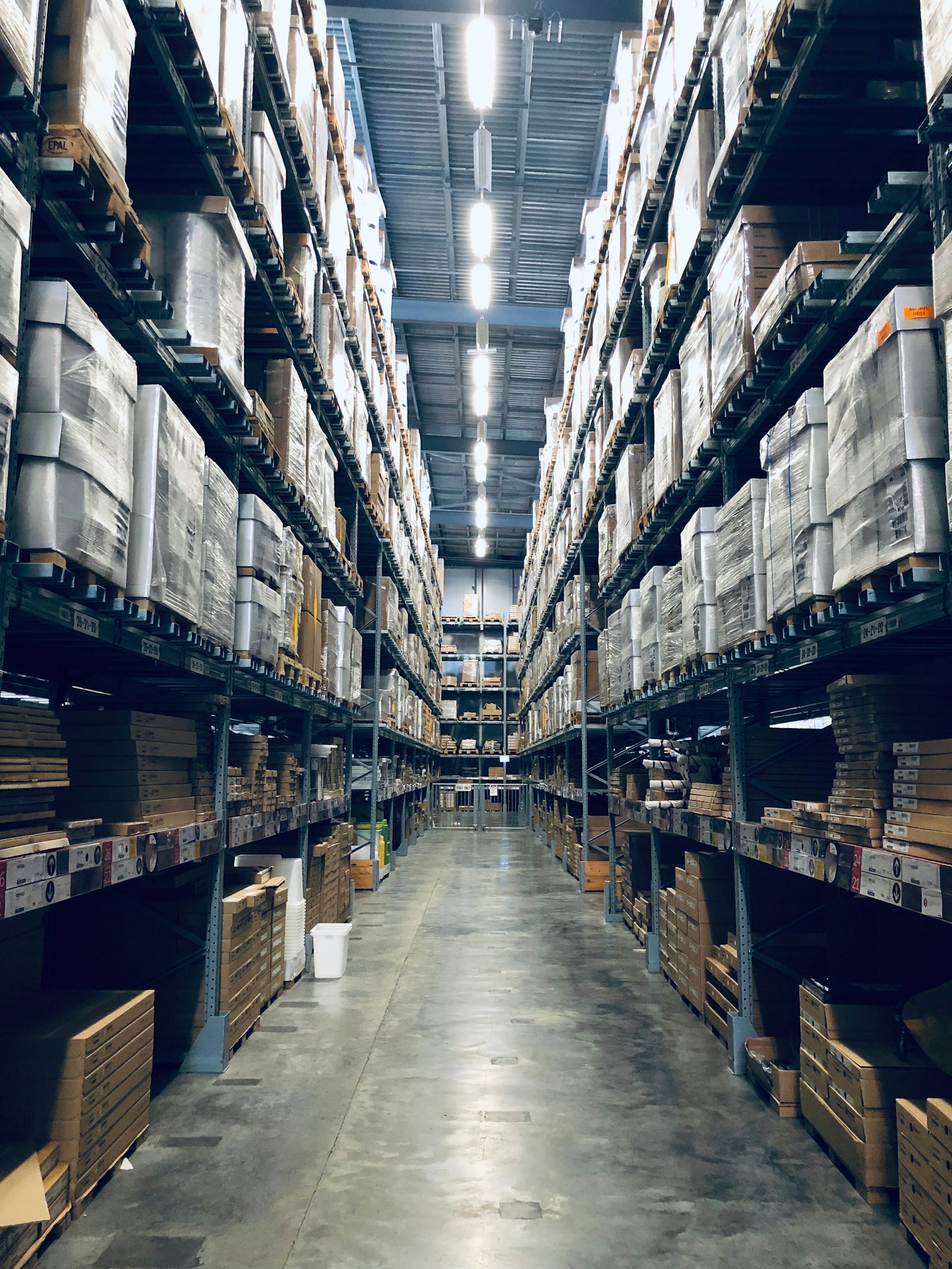 Products organised on warehouse shelves
